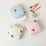 Sac cosmétiques polyestère noir blanc rose bleu cuir mat fermeture glissière poudre compacte brosse