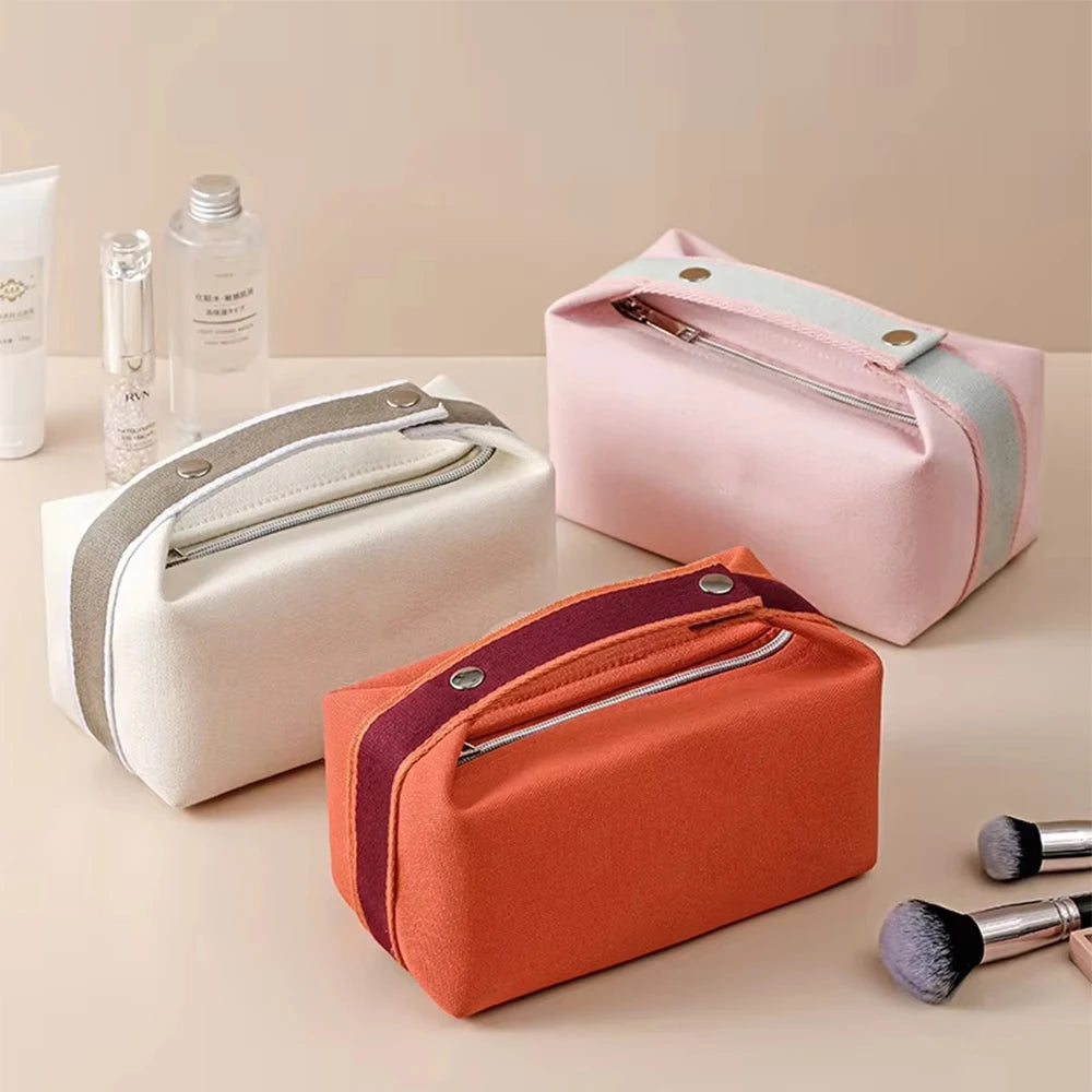 sac cosmétique toile rose clair blanc orange pliable multi usages modernes tridimensionnel porte poignée