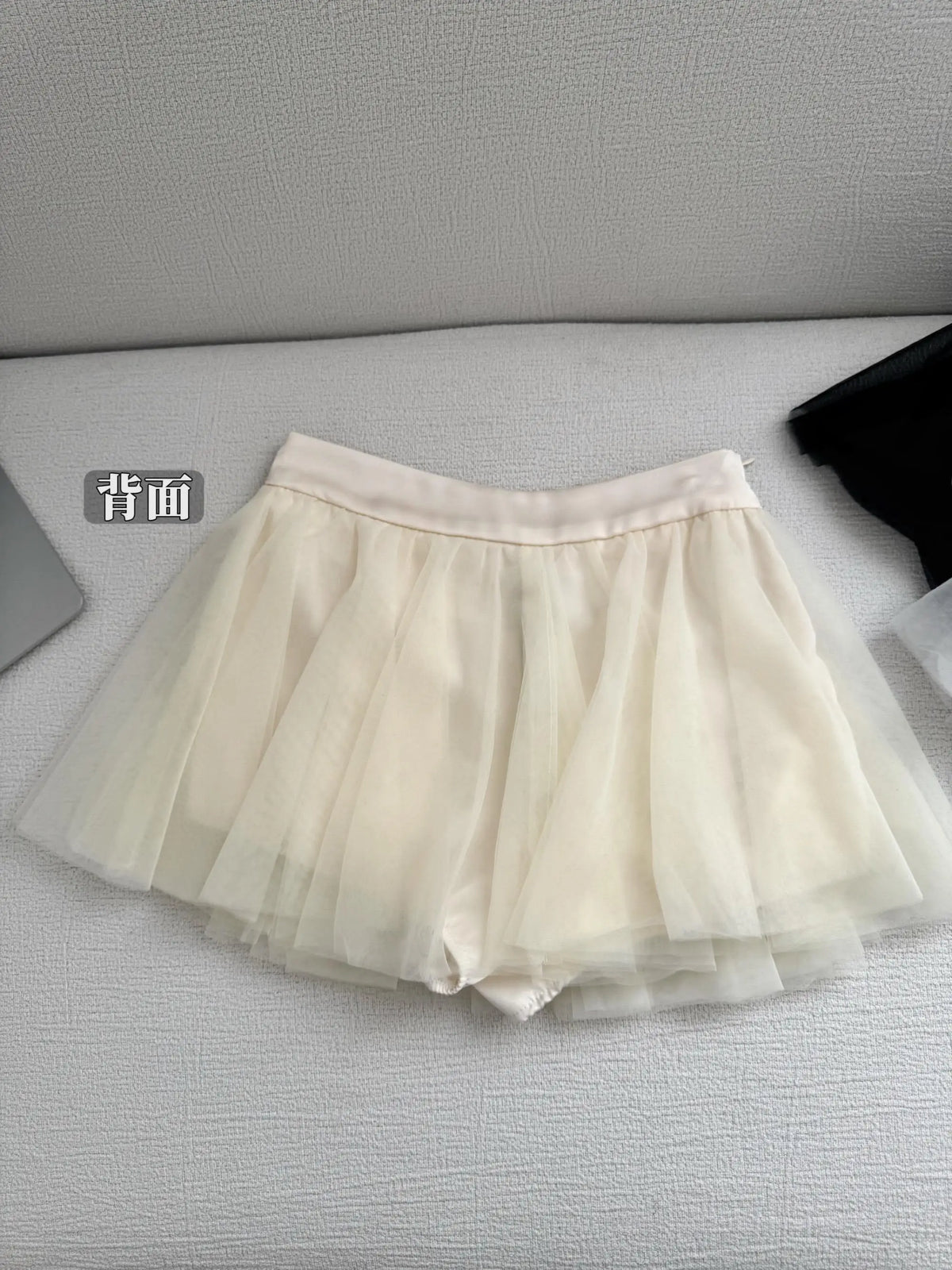 jupe élastique minijupe dessus genou élégante tulle noir blanc féminine chic translucide boutons