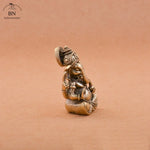 statuette ganesha bronze doré sculptée details complexes religieuse traditionnelle décoration intérieure éléphant dieuhindou ornement