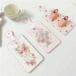 planche découper céramique vintage fleurs roses motifs géométriques blanc roseclair