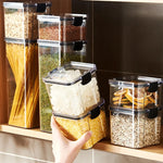 boîtes rangement alimentaires transparentes poignées noires grains pâtes fruits secs moderne pratiques résistantes humides