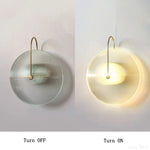 lampe murale led ronde verre moderne blanc doré transparent striée tringle