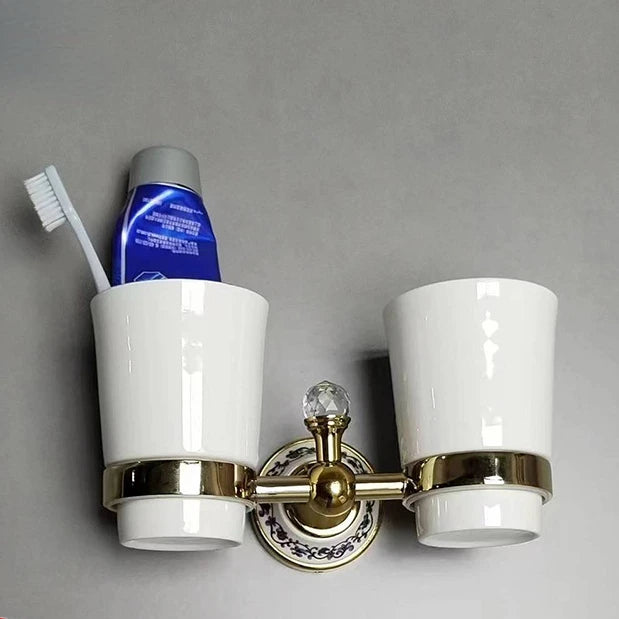ensemble d'accessoires salle bain or blanc bleu motifs floraux anneau serviette porte papier toilette