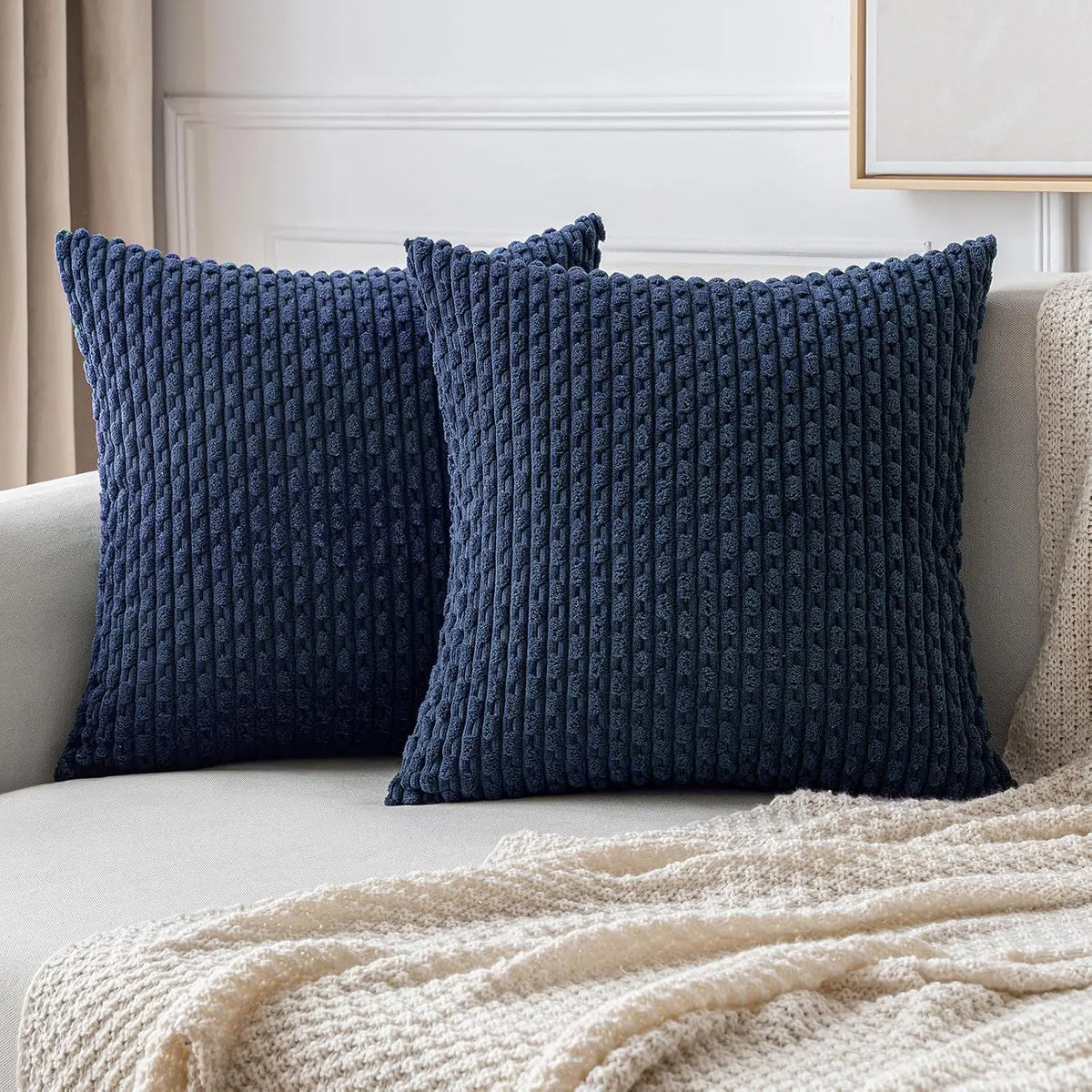 coussin carré orange texture tissée moderne garnissage blanc canapé salon décoration maison