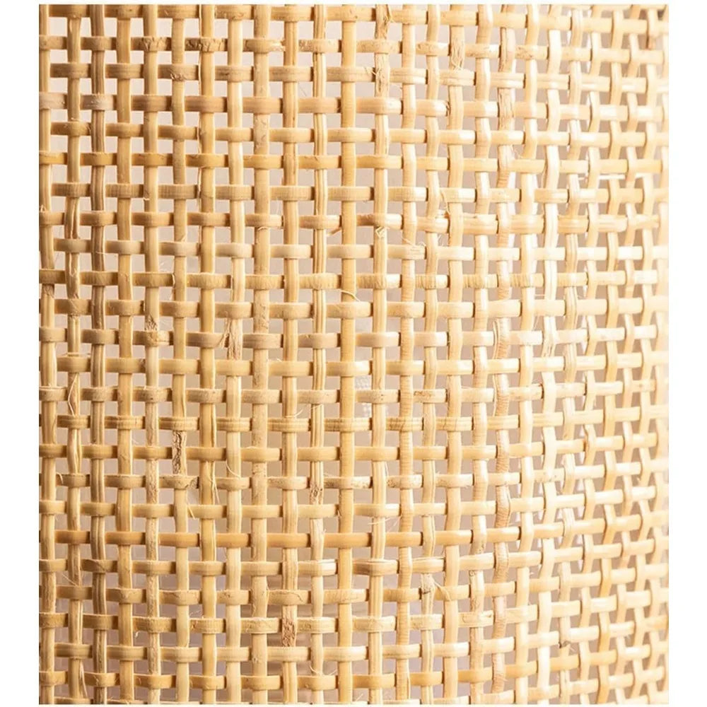 Détail de la tête tissé de l'applique murale en rotin boho
