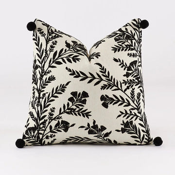 housse coussin carrée motif floral beige marron noir pompons moderne décoration maison