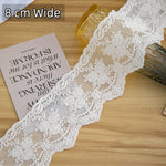 ruban dentelle fleurs blanc mariage classique accessoire couture decoration robe franges