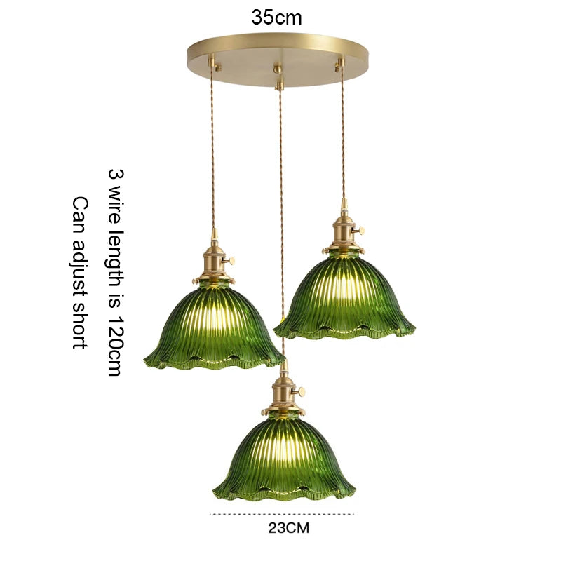 suspension lumineuse vintage vert doré motifs géométriques ampoules câbles chaînes métal