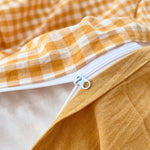 Housse de couette pliée montrant sa couleur et son design