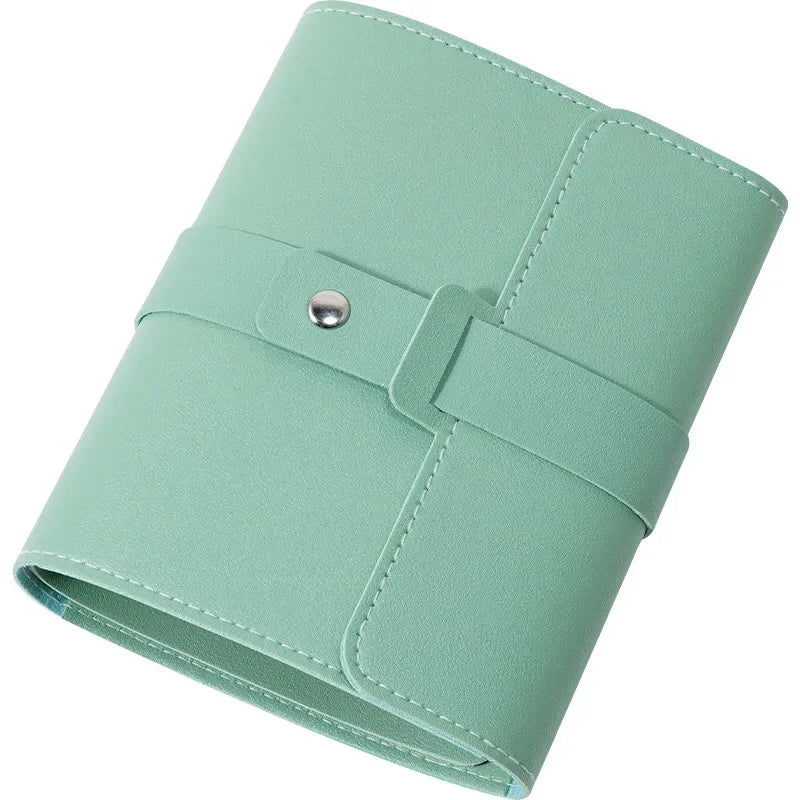 porte bijoux pliable simili cuir vert bleu rose moderne minimaliste boucles d'oreilles voyage télescopique