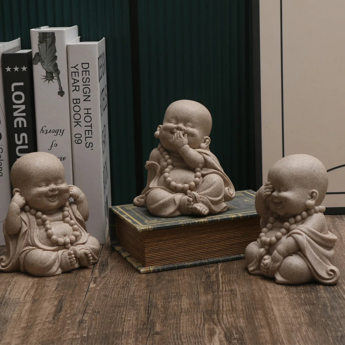 statuettes bouddha enfant résine beige clair marron motifs dorés zen