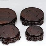 support bois ornements sculptés complexe artisanal marron foncé traditionnel décoration maison objet décoratif stand
