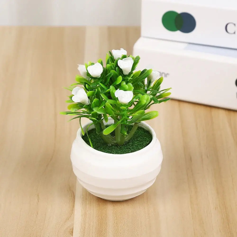 plantes artificielles moderne pot blanc fleurs couleur vert rose jauneintérieur decoration feuilles verte differentes
