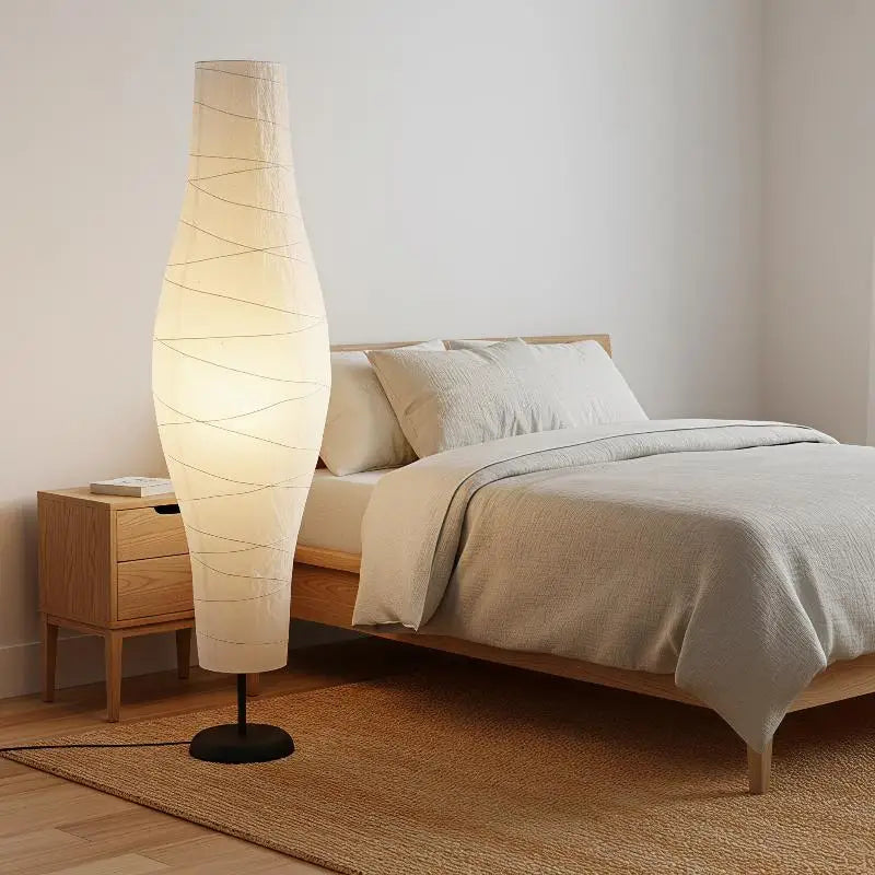 lampe sol moderne blanc rayures diagonales base noire câble chambre coucher nordique