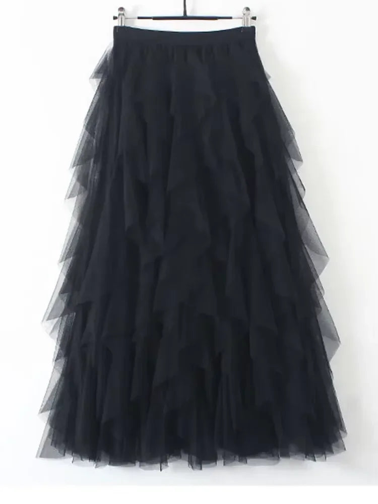 jupe plissée rose clair tulle élégante féminine streetwear élastiquée mi mollet translucent anneaux suspension