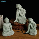 statues bouddha vert clair texture marbre classique décoration intérieure zen espace spiritualité pierre socle