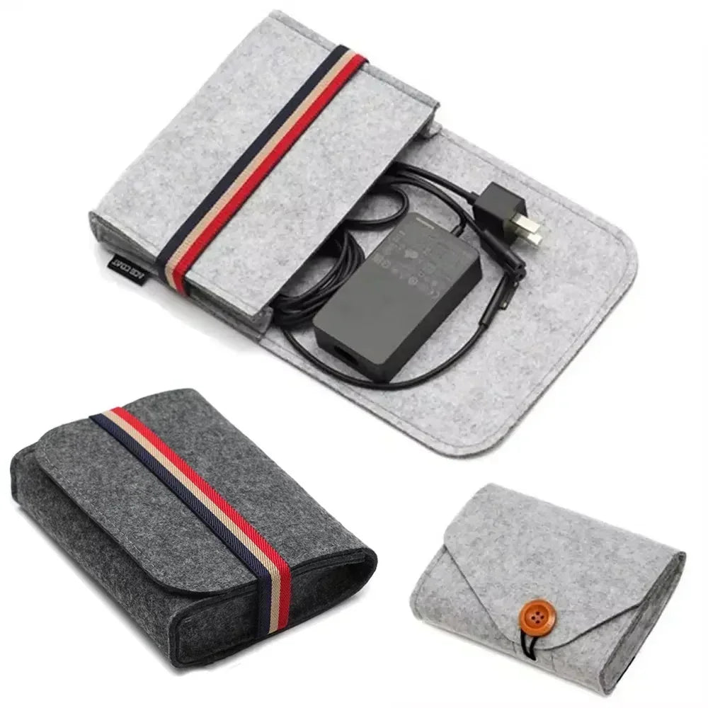 Sac ordinateur portable gris tissu doux moderne chargeurs adaptateurs câbles USB SSD HDD