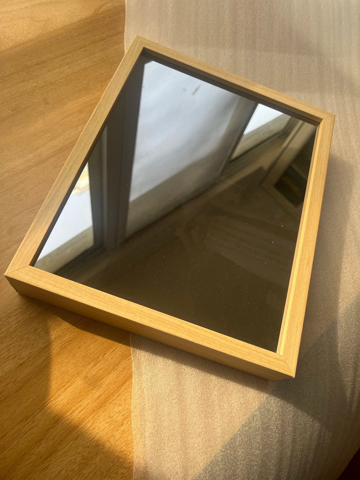 cadre photo miroir éclairage intégré bois clair moderne minimaliste photos portraits fleurs support