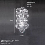 suspension lumineuse verre transparent moderne boules verre câbles acier poli led semi encastré