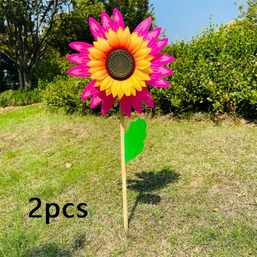 décoration extérieure fleur artificielle jaune rouge bleu vert rayonnante pétale verte tringle jardin cour