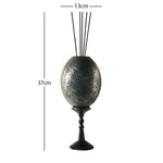 bougie décorative moderne élégante motifs floraux dorés texture ondulée marron clair noir salon diffusion