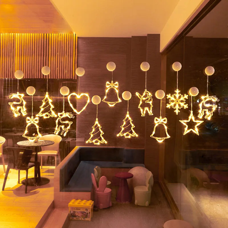 décoration noël guirlande lumineuses étoiles sapins cloches rennes moderne blanc doré