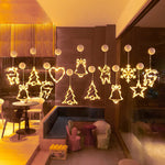 décoration noël guirlande lumineuses étoiles sapins cloches rennes moderne blanc doré