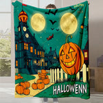 L'image montre une scène de Halloween festive avec une maison hantée, des citrouilles, des chauves-souris et une lune pleine dans un ciel nocturne. Une personne tient une grande couverture ou couverture murale avec le texte "Halloweenn".