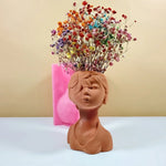 vase silicone forme buste humain blanc rose marron visage stylisé moderne
