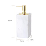 ensemble salle bain marbre blanc doré distributeur savon boîte mouchoirs diffuseur moderne