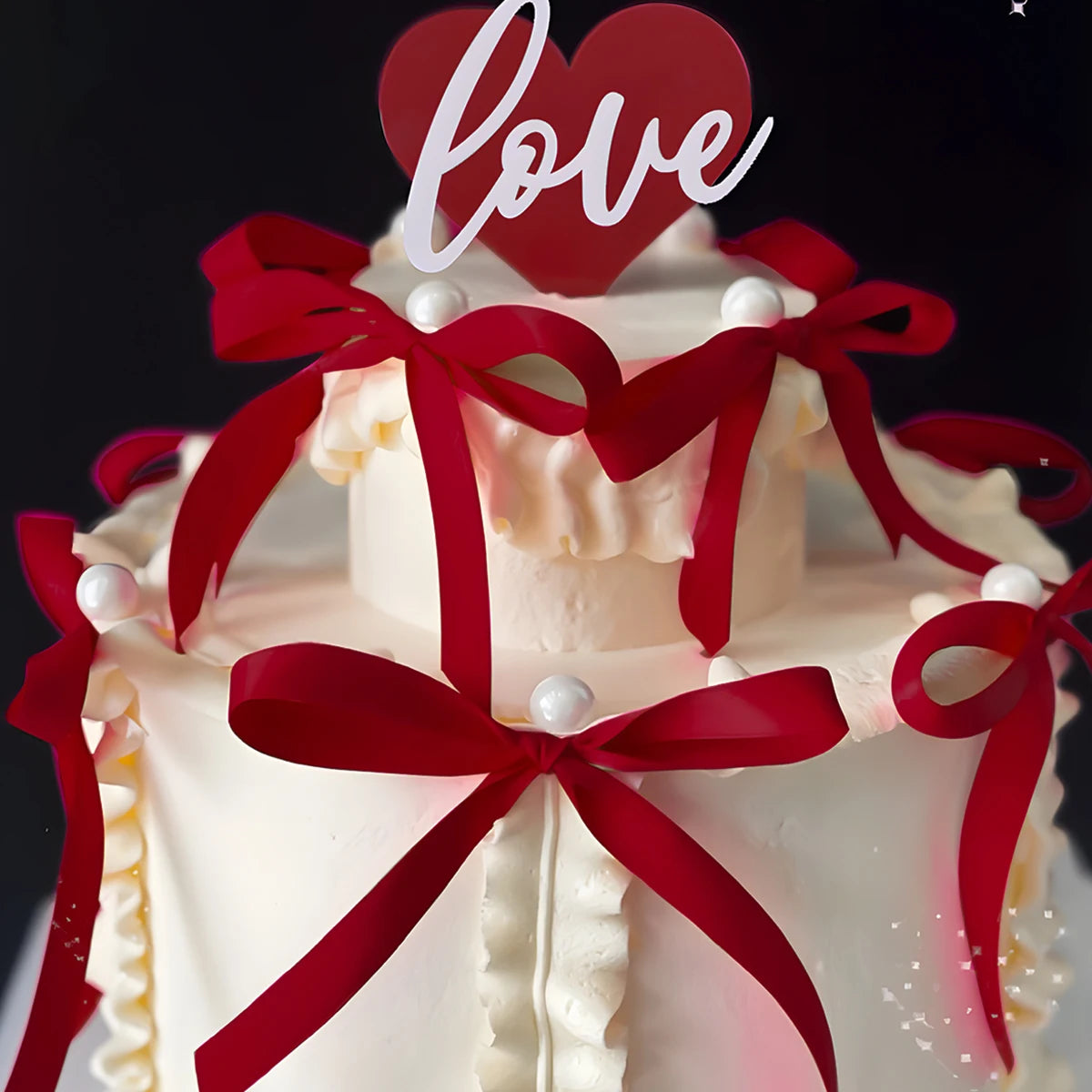 décoration gâteau mariage ruban nœud rouge rose glaçage texturé nacrées festive