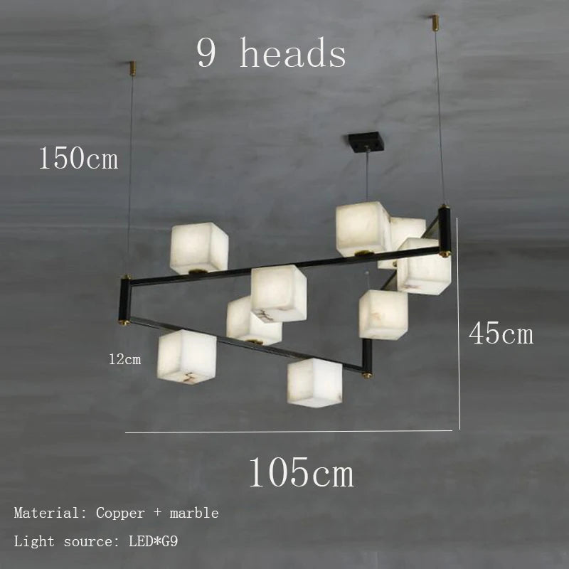 suspension lumineuse moderne marbre noir blanc or rose fixée câbles chambre salon