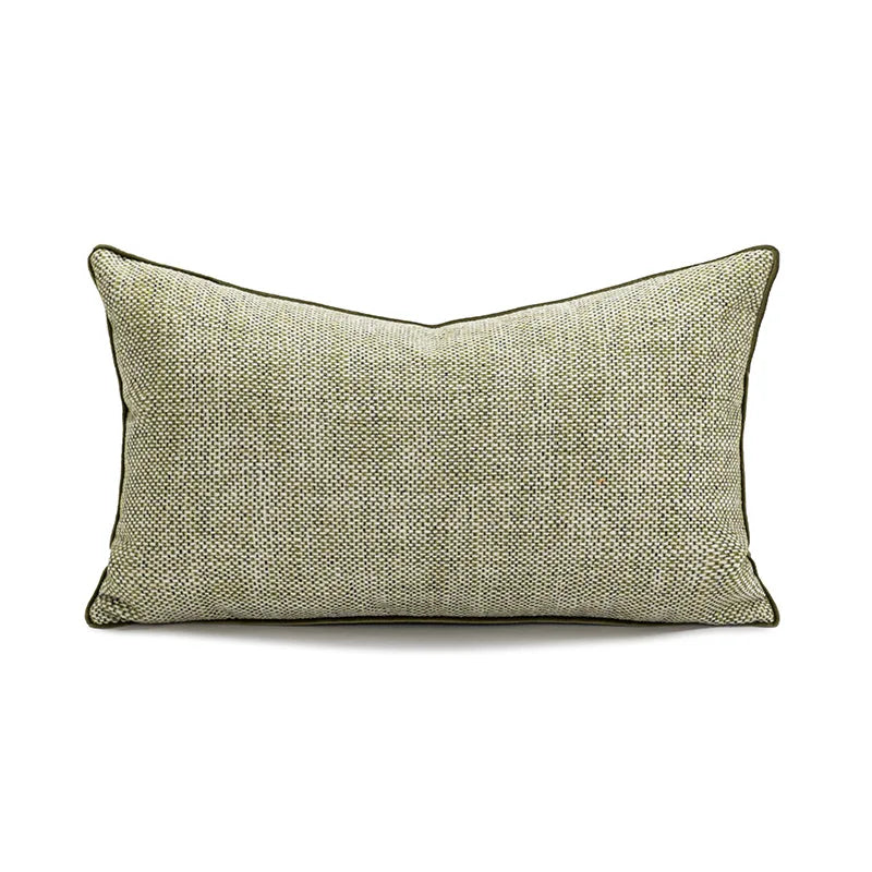 Coussin d'accent décoratif rectangulaire de couleur vert olive avec un motif texturé.