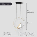 Suspension lumineuse ovale contemporaine oiseau noir doré salon chambre