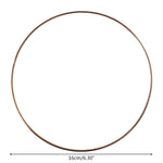 anneaux suspension dorés ronds concentriques métal opaques tailles variées moderneintérieurcoration minimaliste