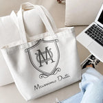 sac main toile blanche pochette logo poignées détachables fermeture éclair