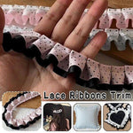 rubans franges dentelles pois noirs rose clair blanc cheveux décoration élégante partie