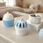 diffuseur huiles essentielles silicone blanc bleu vert motifs géométriques fenêtres modernes