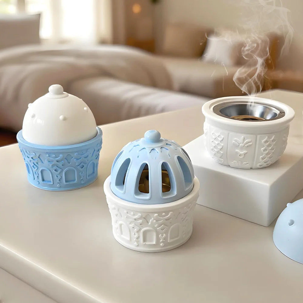 diffuseur huiles essentielles silicone blanc bleu vert motifs géométriques fenêtres modernes