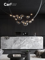 lustre suspension moderne minimaliste noir transparent doré globes organiques chambre salon