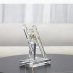 support smartphone transparent moderne figurine dorée minimaliste chambre