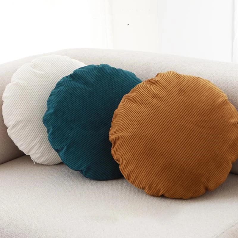housse coussin ronde velours côtelé rayures horizontales décoration canapé salon moderne rose pâle