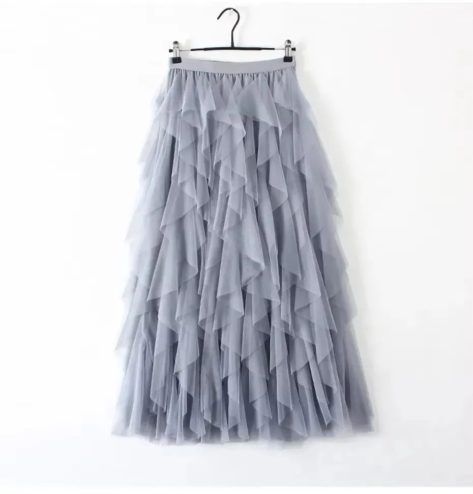 jupe plissée rose clair tulle élégante féminine streetwear élastiquée mi mollet translucent anneaux suspension