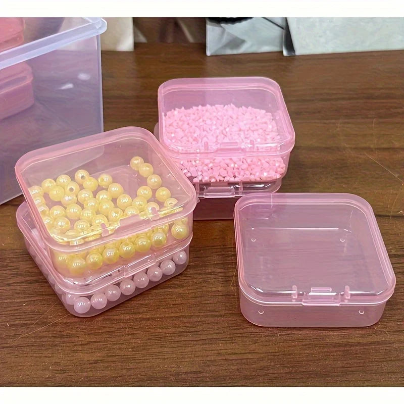 boîtes rangement plastique rose bleu vert orange modernes pratiques poignée