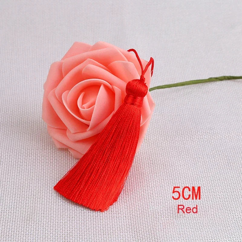pompons polyester couleur variée 5cm longueur 18cm décoration artisanale rideaux couture pièces