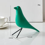 décor oiseau bois peint jaune noir rouge bleu blanc vert pieds métalliques moderne salon