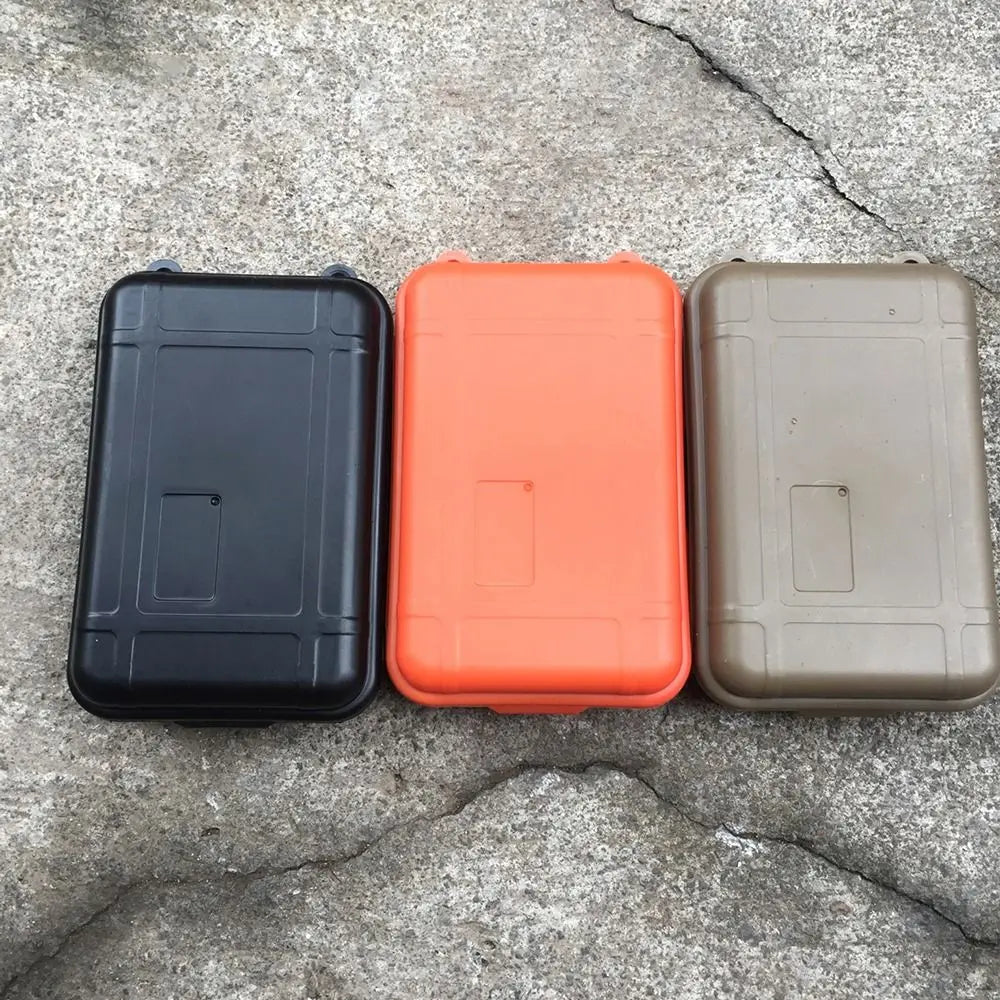 boîte rangement voyage plastique empilable orange noir marron texture mat étanche clips coussin insertion