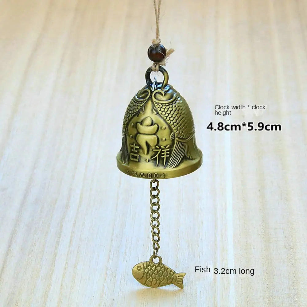 cloche décorative artisanale bronze doré motifs poissons oiseaux vintage(chaines bois)