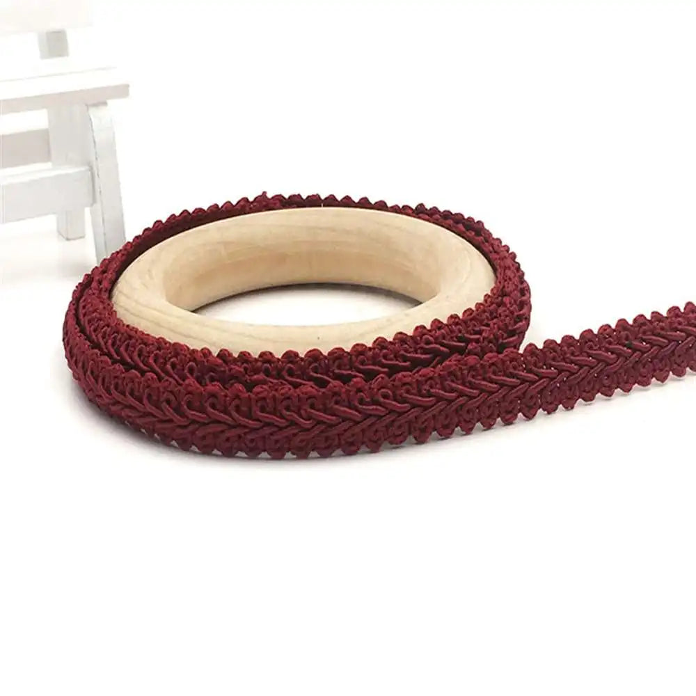 ruban décoratif dentelle polyester 12mm rouge violet noir vert feuillu texturé opacité anneaux bois